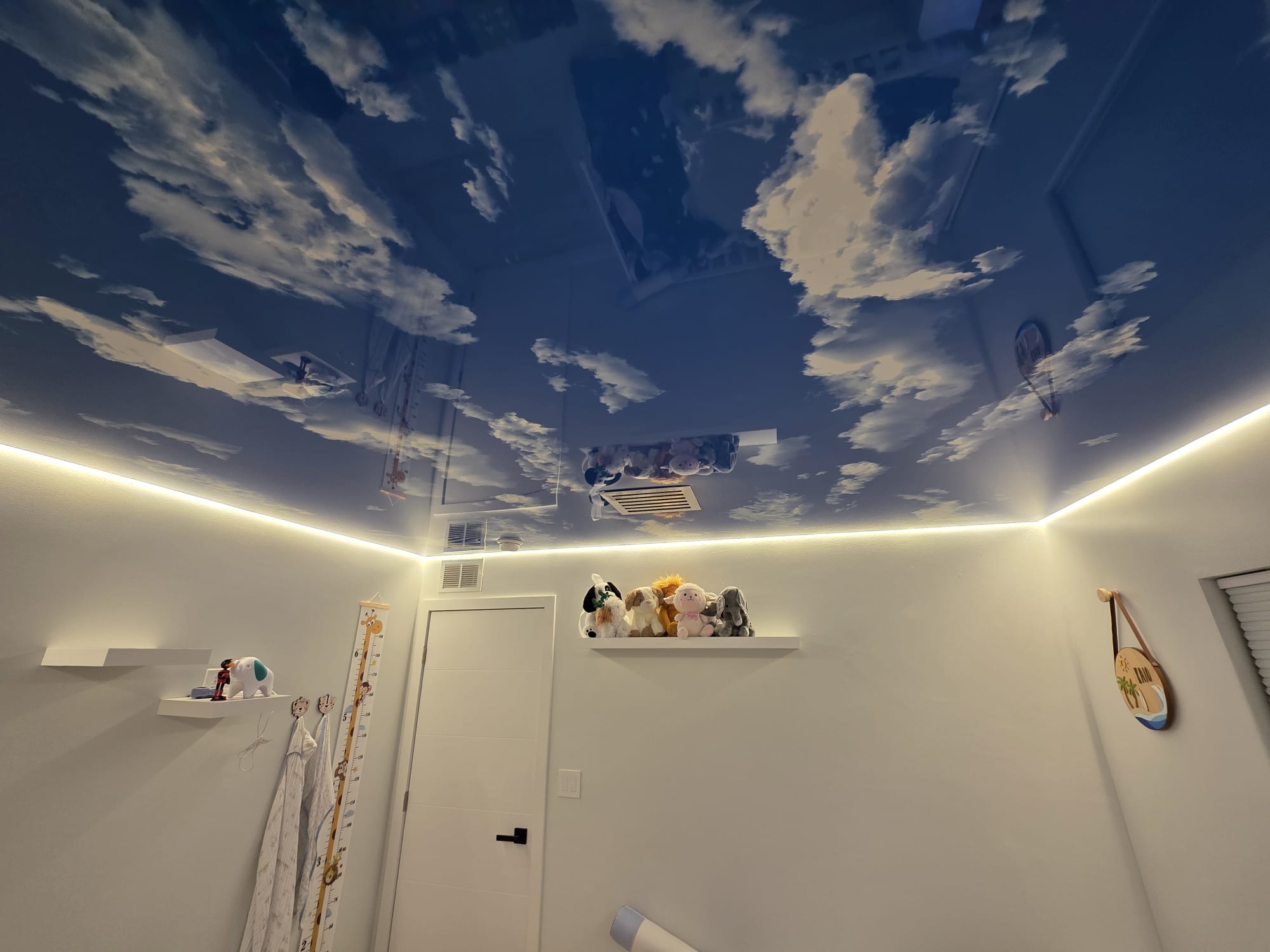 Stretch ceiling finish with integrated lighting.