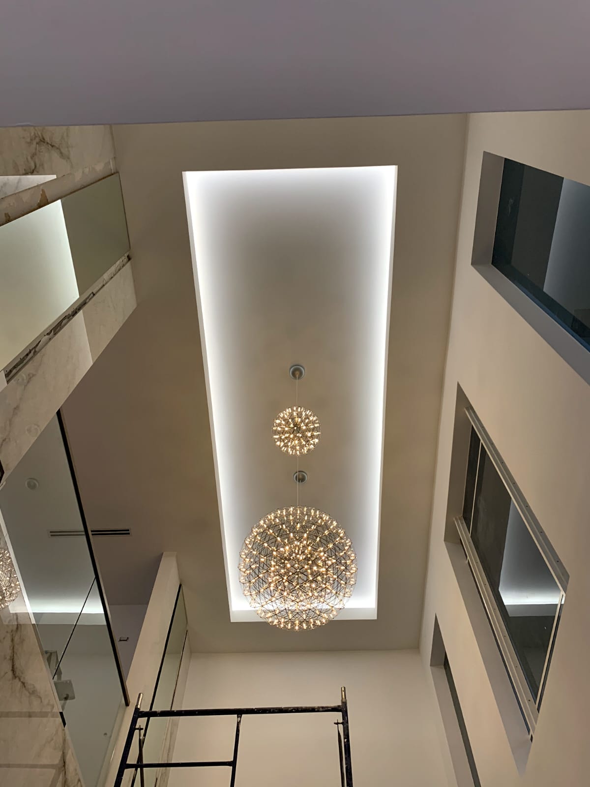 Interior lighting detail showing premium KWLUX lighting and design work.